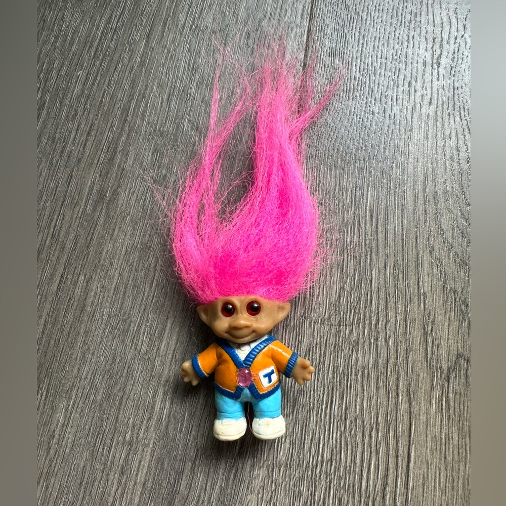 90’s Ace Novelty mini troll with pink hair in cardigan and rectangle pink jewel